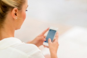 Business woman using smart phone